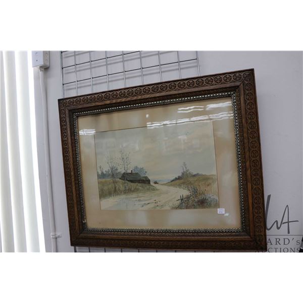 Antique watercolour in carved oak frame of a coastal farming scene, signed by artist Louis Kinney Ha