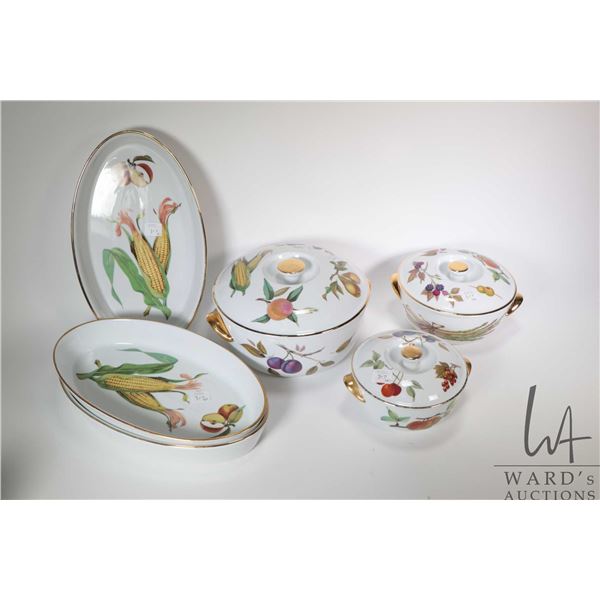 Three Royal Worcester Evesham Gold round deep lidded casseroles including 8 1/2" , 7 1/2" and 6 1/2"