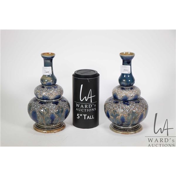 Pair of Doulton Lambeth vases, both with artist marking and dated 1876, each is 7 1/2" in height