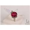 Image 1 : Birks 10kt white gold ring set with oval synthetic ruby gemstone and four single cut accent stones