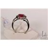 Image 2 : Birks 10kt white gold ring set with oval synthetic ruby gemstone and four single cut accent stones