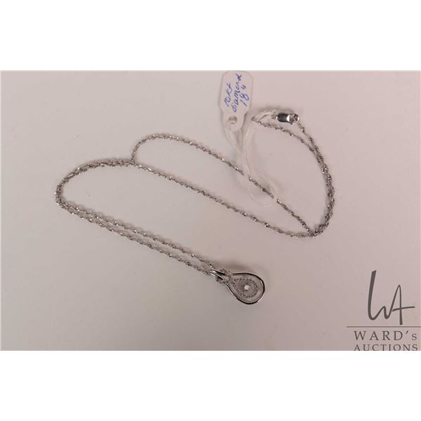 Ladies 10kt white gold and "Infinity" pendant with flickering center diamond gemstone and round whit