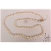Image 1 : Vintage graduated strand of genuine pearls with 14kt yellow gold clasp, 18" in length