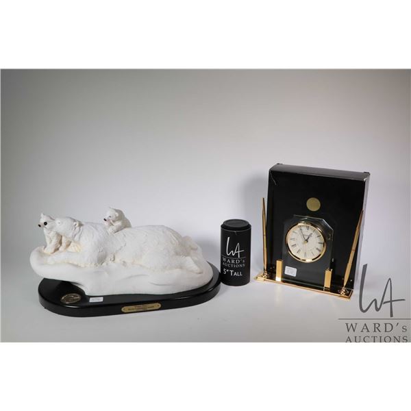 Ducks Unlimited "Polar Play" limited edition sculpture 307/1000 16" in length and a Movado quartz cl