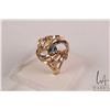 Image 1 : Ladies 10kt yellow gold ring set with aquamarine gemstone, size 7.25