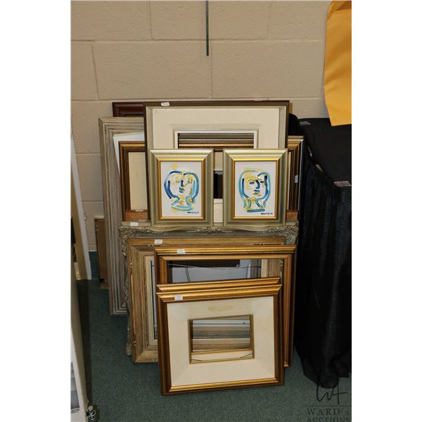 Large selection of assorted picture frames, some with glass, fifteen in total. Note: Not available f