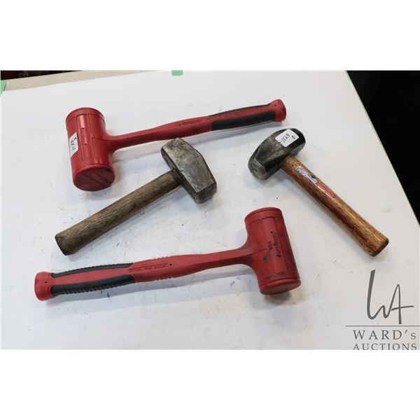 Two Snap-On dead blow hammers and two small sledge hammers