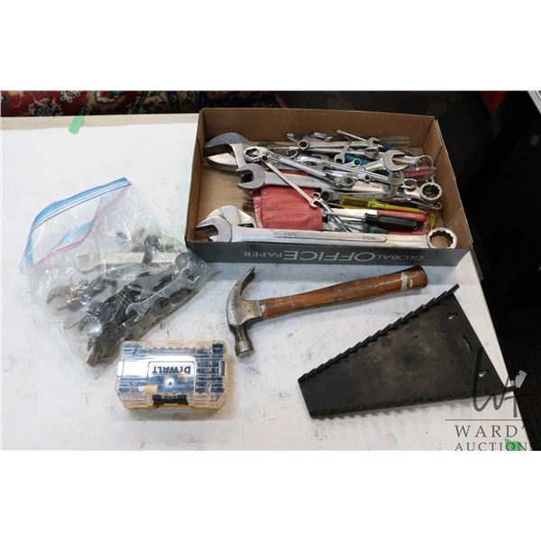 Selection of tools including adjustable wrenches, combination wrenches, flat wrenches, screwdrivers,