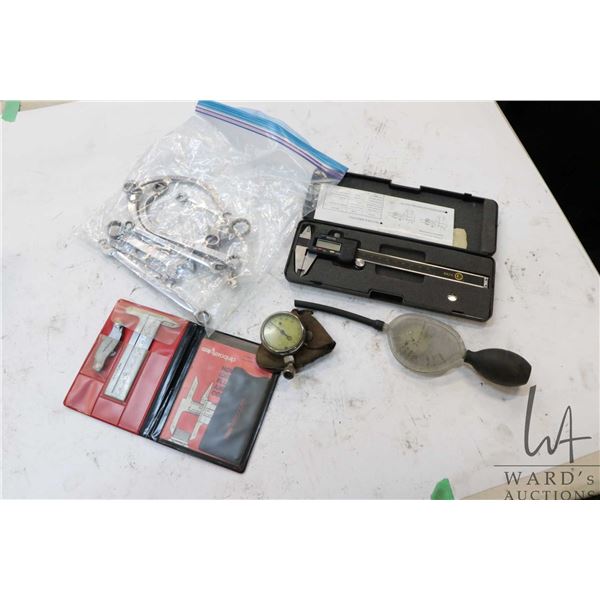 Snap-On and Mac Tools including special purpose wrenches, digital calipers, port and connector ident