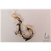 Image 1 : 14kt yellow and white gold high and matte polished "hook" pendant. Retail replacement value $2,800.0