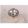 Image 1 : 14kt yellow gold with white gold setting kunzite and diamond ring. Set with 8.05ct oval mixed cut li