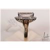 Image 2 : 14kt yellow gold with white gold setting kunzite and diamond ring. Set with 8.05ct oval mixed cut li