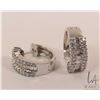 Image 1 : 18kt white gold and diamond earrings. Set with .44ct of round full cut brilliant white diamonds and 