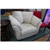 Image 2 : Modern overstuffed large armchair and a love seat with cream micro fiber upholstery