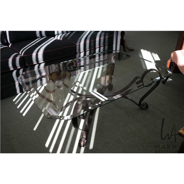 Semi contemporary metal and beveled glass coffee table