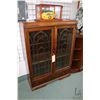 Image 1 : Art Deco waterfall design, two door display cabinet with drawer base and original pulls, 46" high X 