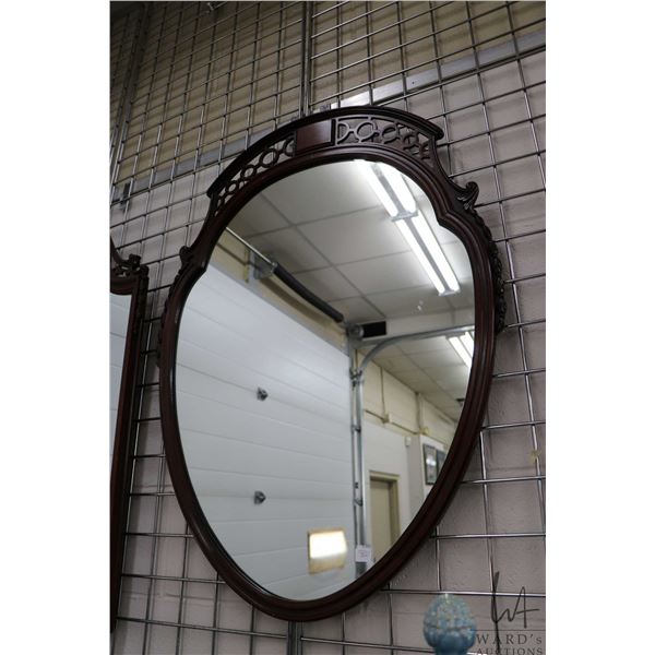 Antique shield shape wall mirror with fret work top, 37" X 27". Note: Not available for shipping. Lo