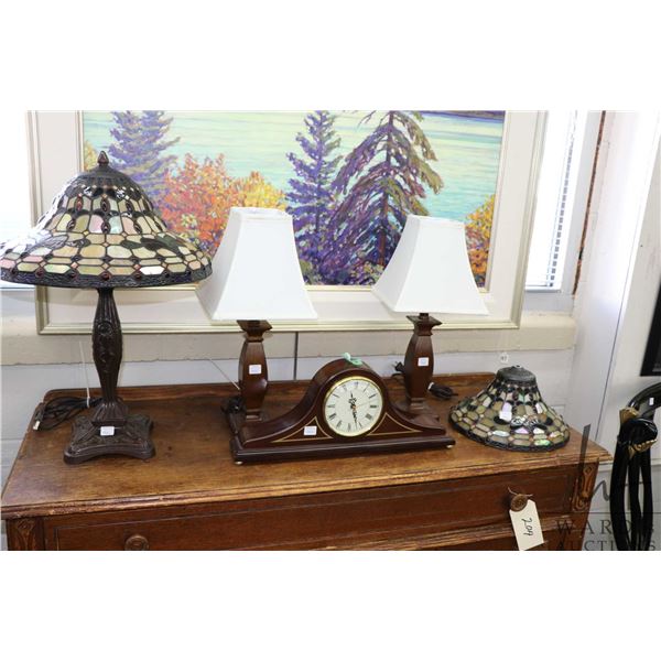 Selection of decor including quartz top hat mantle clock, two matching lamps, one on case lamp with 