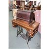 Image 1 : Antique treadle sewing machine cabinet made by Madoc with no machine and a portable hand cranked Sin