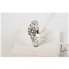 Image 1 : 19kt white gold and diamond ring set with 0.45ct brilliant cut white center diamond and two brillian