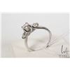 Image 2 : 19kt white gold and diamond ring set with 0.45ct brilliant cut white center diamond and two brillian