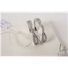 Image 1 : 14kt white gold and diamond jacketed band set with 62 round brilliant cut diamonds. Total carat weig