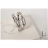 Image 2 : 14kt white gold and diamond jacketed band set with 62 round brilliant cut diamonds. Total carat weig