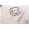 Image 3 : 14kt white gold and diamond jacketed band set with 62 round brilliant cut diamonds. Total carat weig