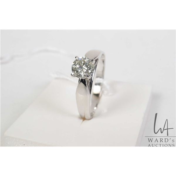 14kt white gold and Canadian diamond solitaire ring, set with 0.58ct Canadian Maple Leaf diamond, la