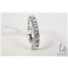 Image 1 : 14kt white gold and diamond ring, set with seven round brilliant cut white diamonds. Total diamond w