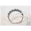 Image 2 : 14kt white gold and diamond ring, set with seven round brilliant cut white diamonds. Total diamond w