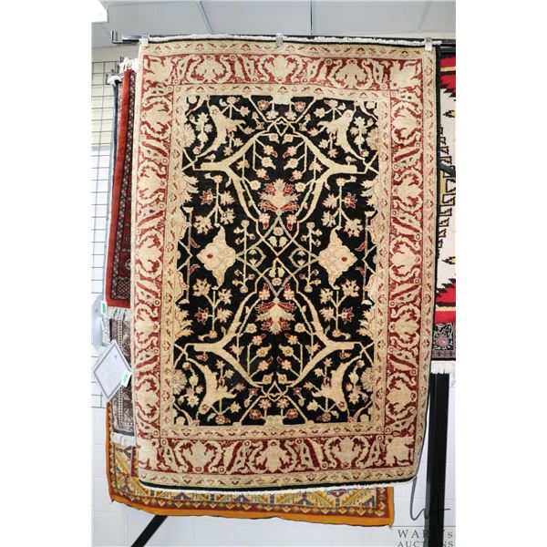 Quality wool area carpet with black background, deep taupe and brick highlights, 59" X 34"