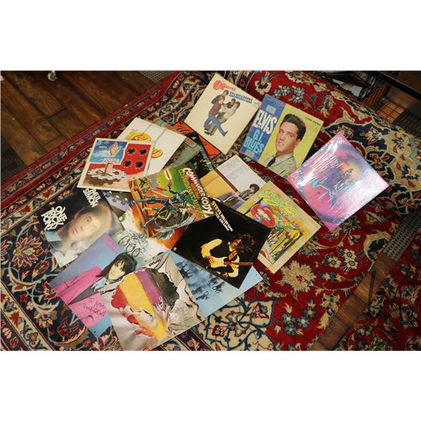 Twenty two vintage albums including Rolling Stone, Elvis, Johnny Cash, Eagles, Arrowsmith, Bob Seger