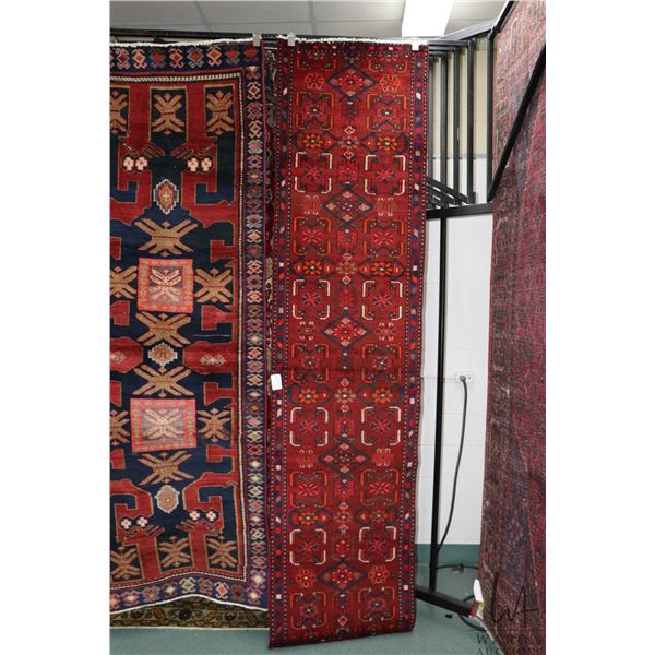 100% handmade Iranian wool "Zanjan" carpet runner with red background, overall geometric design and 