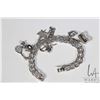 Image 1 : Sterling silver charm bracelet with seven charms