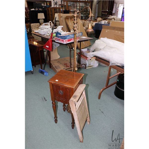 Mid 20th century single door smoker's cabinet, a wood and cast bridge lamp and a wood and brass "The