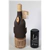 Image 1 : Tree motif, factory sealed bottle purportedly filled with Mexican rum, bottle labeled "Elaborado en 