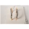 Image 1 : Two 14kt yellow gold matching wedding bands each set with .25ct of brilliant cut white diamonds, one