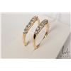 Image 2 : Two 14kt yellow gold matching wedding bands each set with .25ct of brilliant cut white diamonds, one