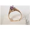 Image 2 : Ladies 10kt yellow gold ring set with oval amethyst gemstone and six small accent diamonds
