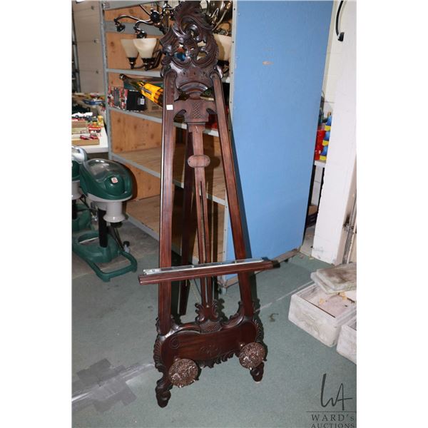 Mahogany Victorian style picture display easel with carved decoration, 70" in height