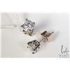 Image 1 : Pair of 14kt white gold solitaire diamond earrings including one round brilliant cut white 0.72ct di