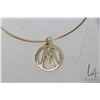 Image 2 : 18kt yellow gold "M" pendant with British gold hallmarks including London mark and date code for 197