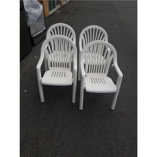 4 WHITE STACKING PATIO CHAIRS