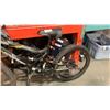 Image 8 : BLACK HYPER BIKE AND PINK BIKE