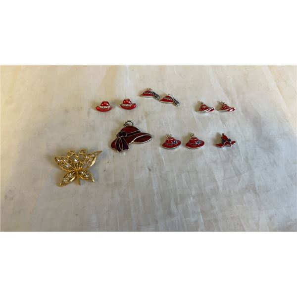 COLLECTION OF RED HAT PENDANT, CHARMS, AND EARRING WITH BUTTERFLY BROOCH