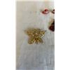 Image 2 : COLLECTION OF RED HAT PENDANT, CHARMS, AND EARRING WITH BUTTERFLY BROOCH
