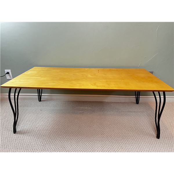 Wooden coffee table with cast iron legs