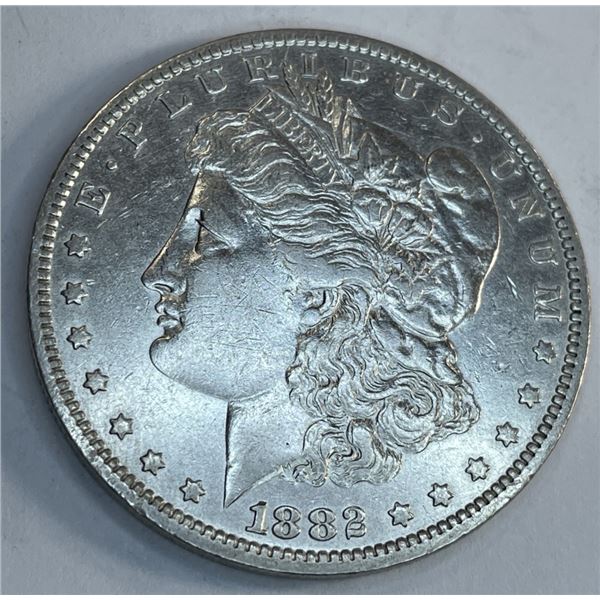 1882 o AU Grade Morgan Silver Dollar