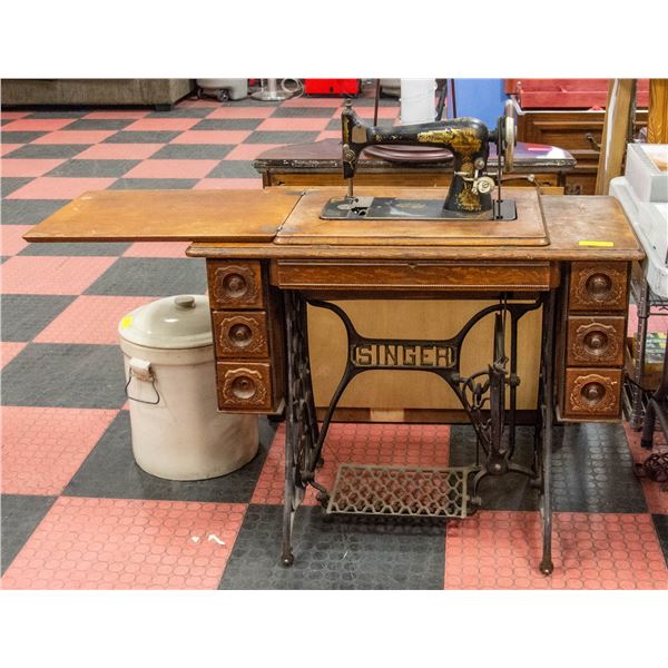 SINGER SEWING MACHINE ON STAND